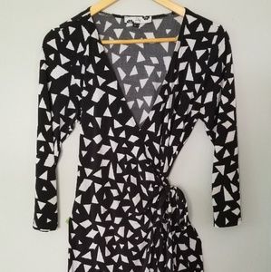 Black and white, flattering wrap around dress